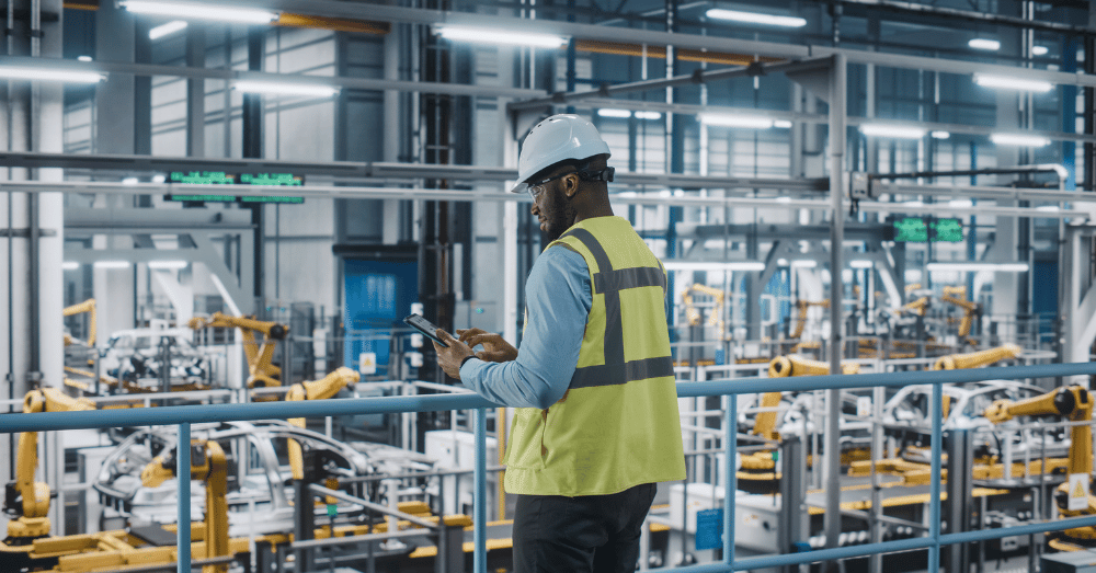 How Midwestern States Are Powering America's Automotive Supply Chain - man looking over an assembly line